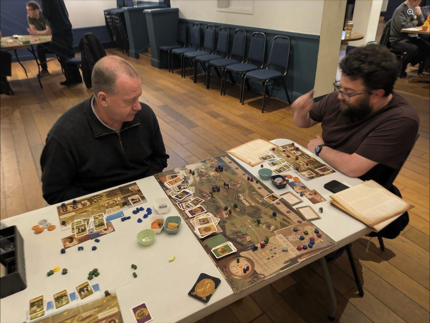 A busy ELBG board game table